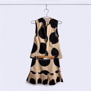 Lovethanks black and cream patterned vest and skirt set. Vest is XS. Skirt is S.